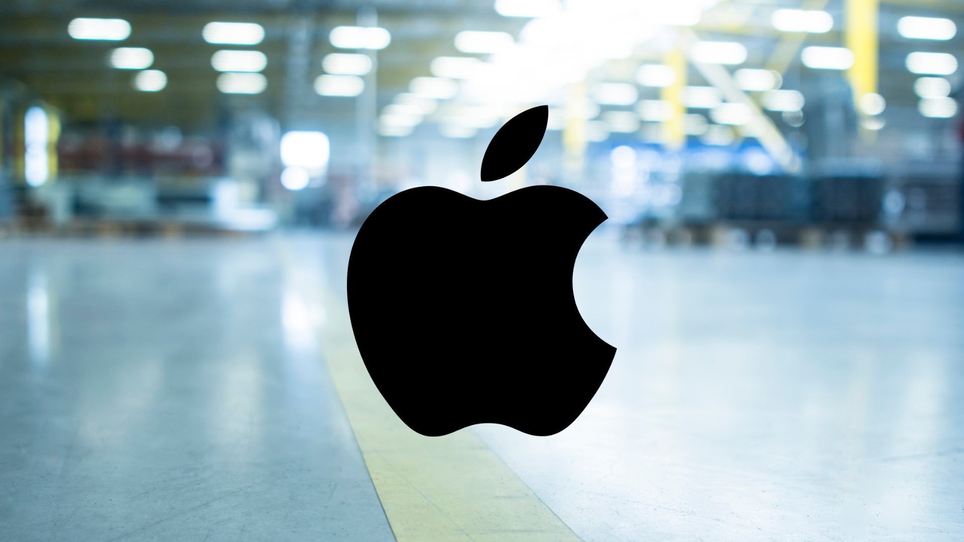 Logo da Apple com fábrica de fundo