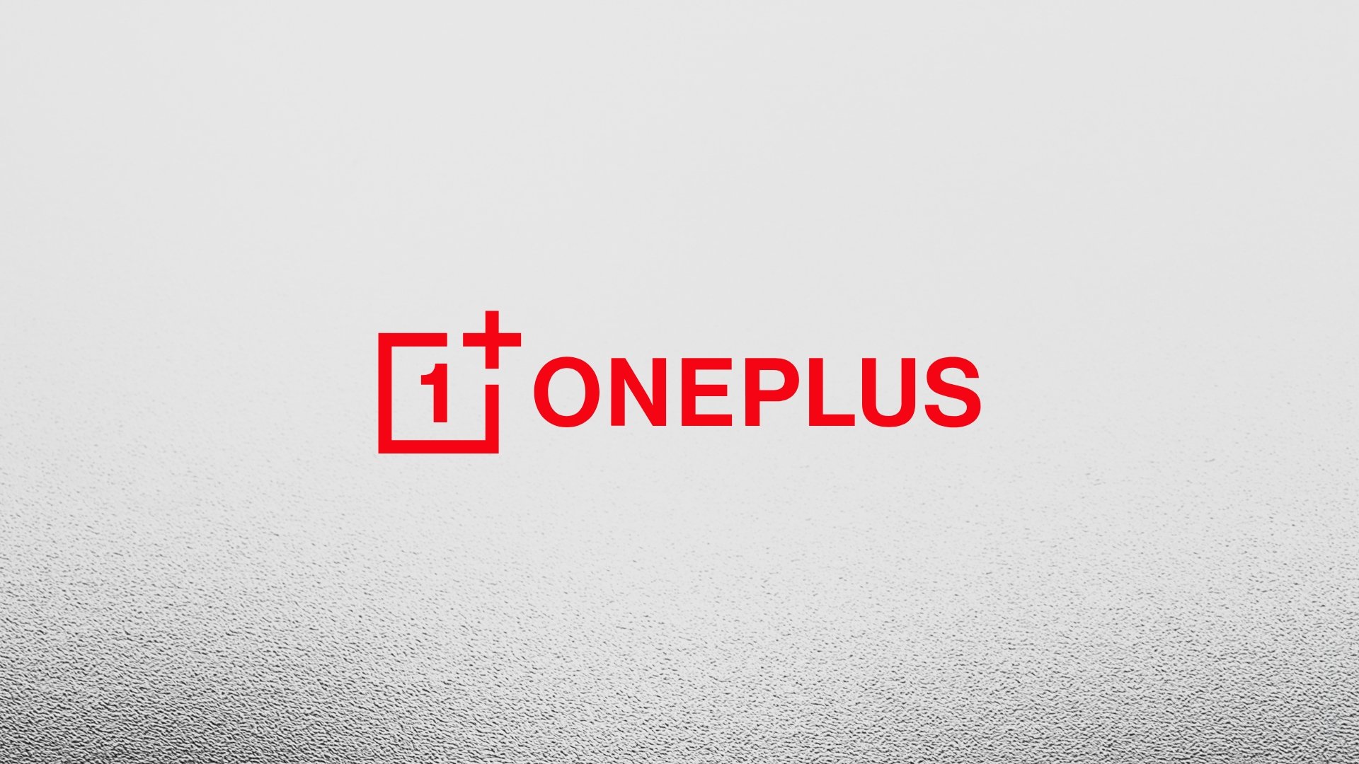 Logo da OnePlus em vermelho e fundo branco