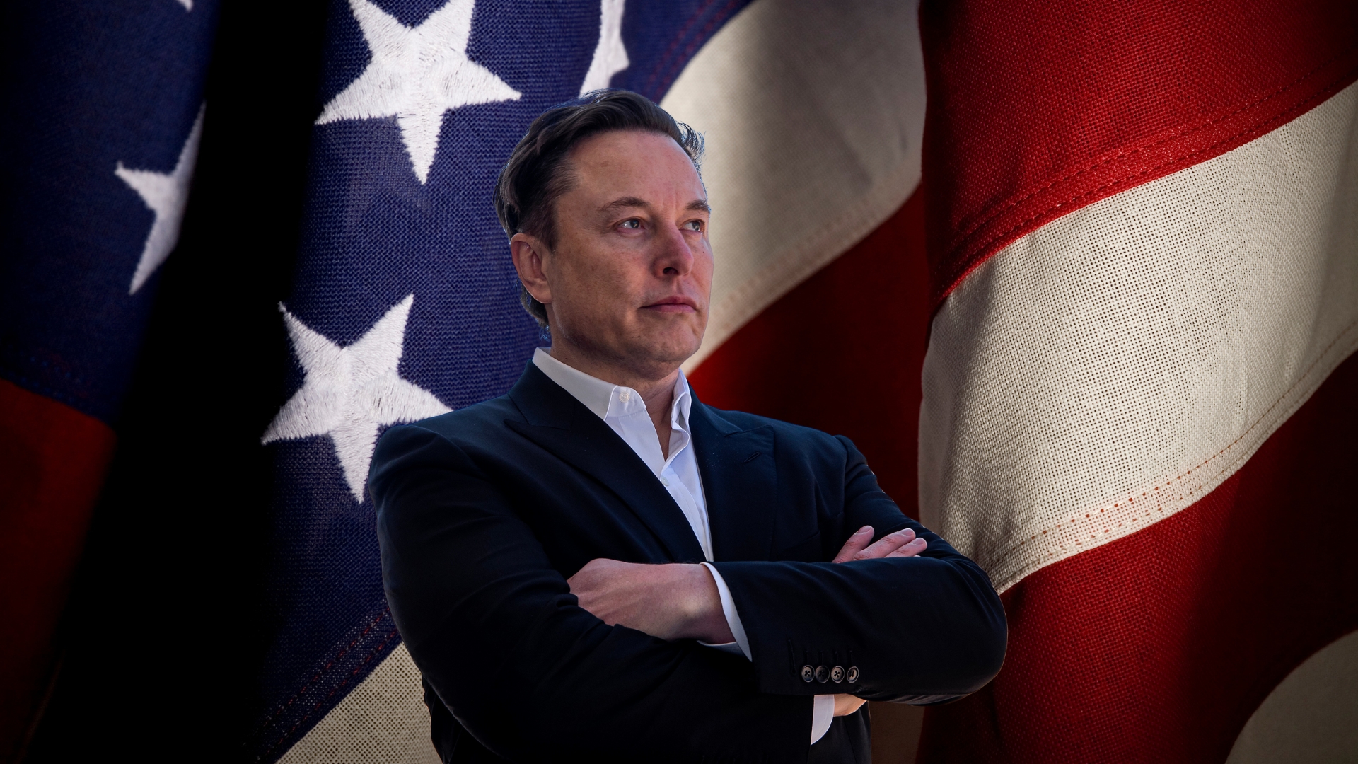 Elon Musk e bandeira dos EUA