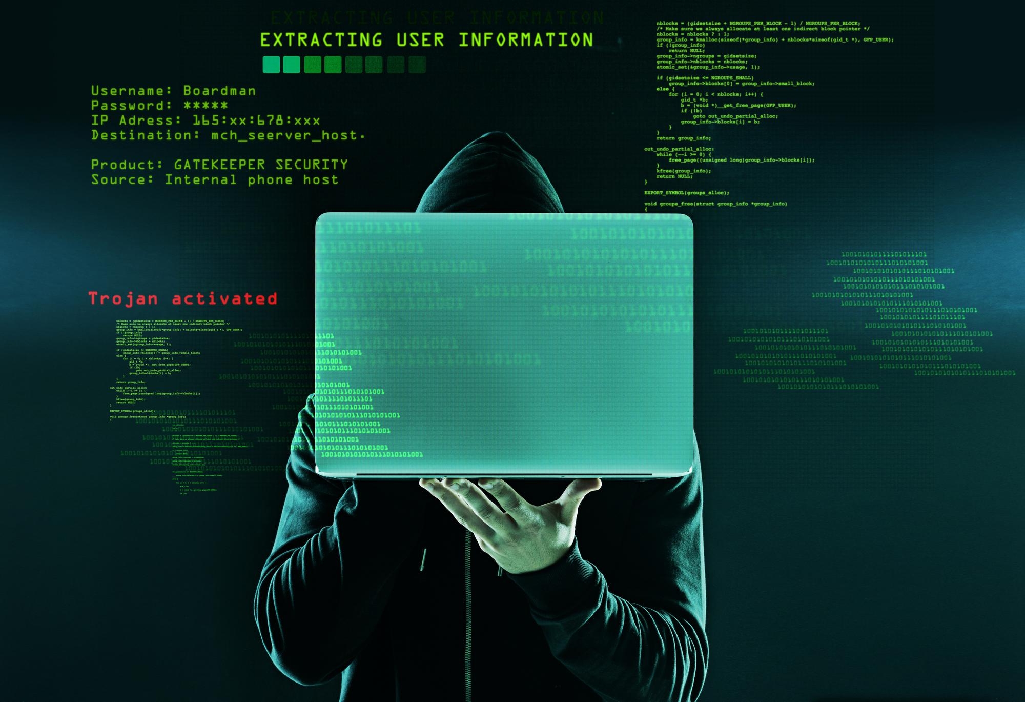 Hacker em frente de computador com fundo digital em código