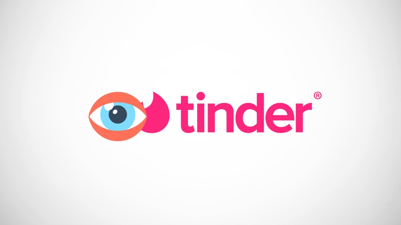 Tinder com olho em cima do logo