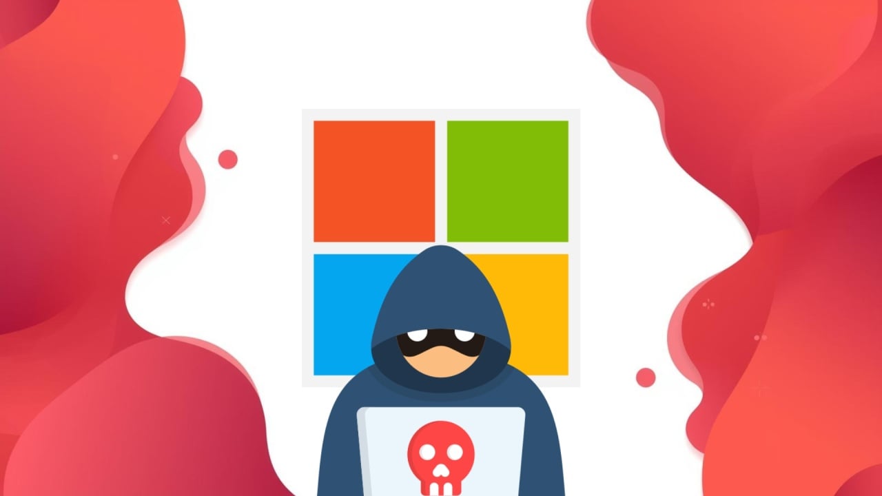 Microsoft com hacker em frente do logo