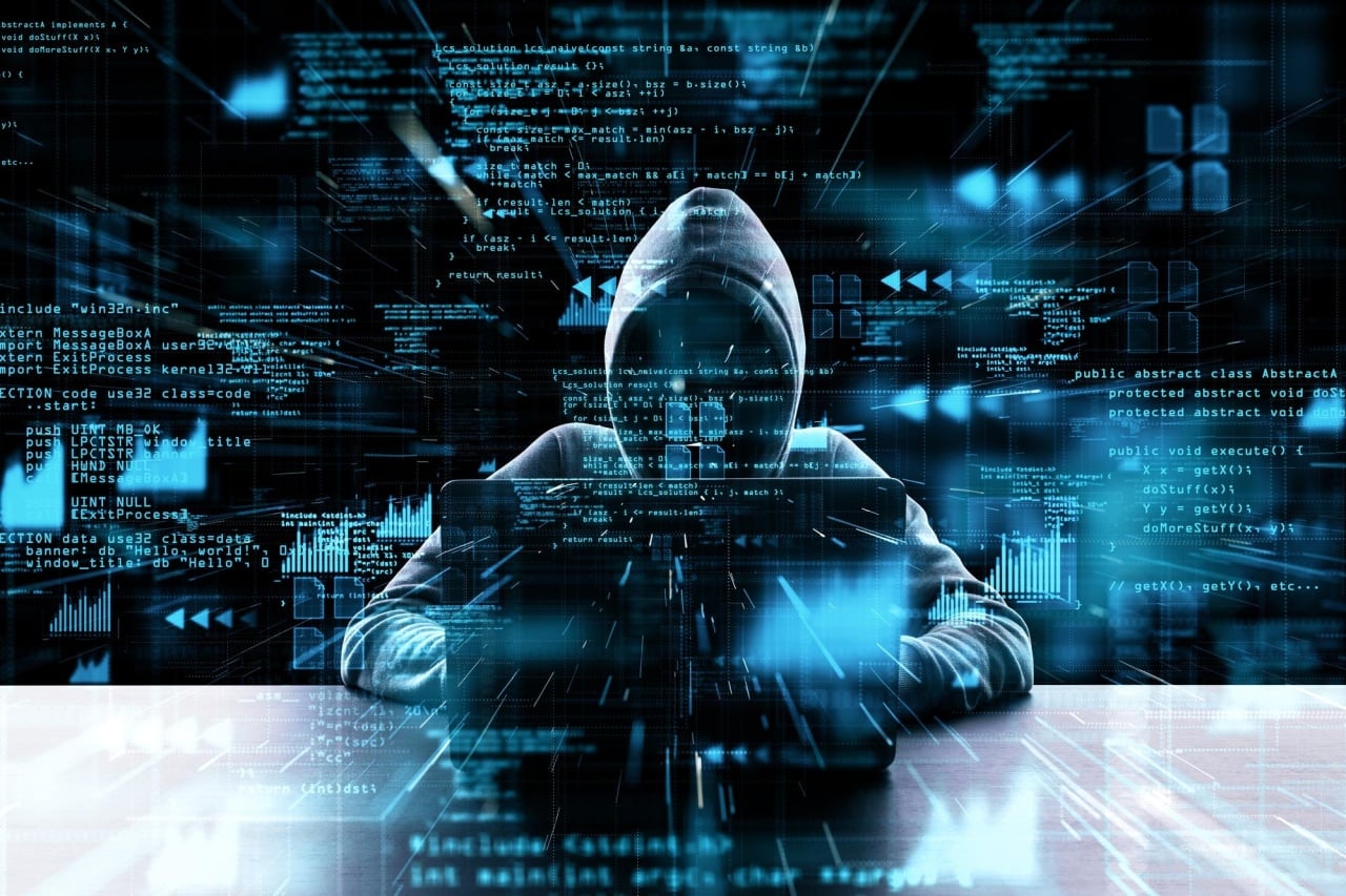 hacker em formato digital em frente de computador