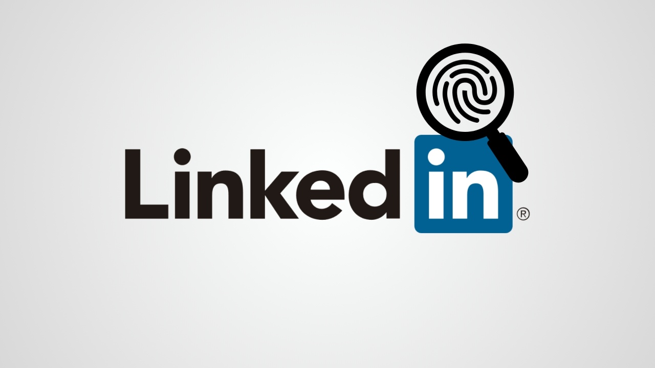 LinkedIn com impressão digital em lupa