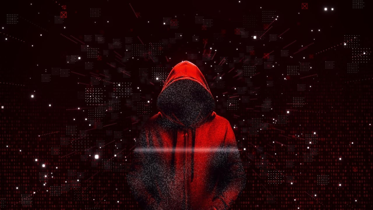 hacker em fundo vermelho
