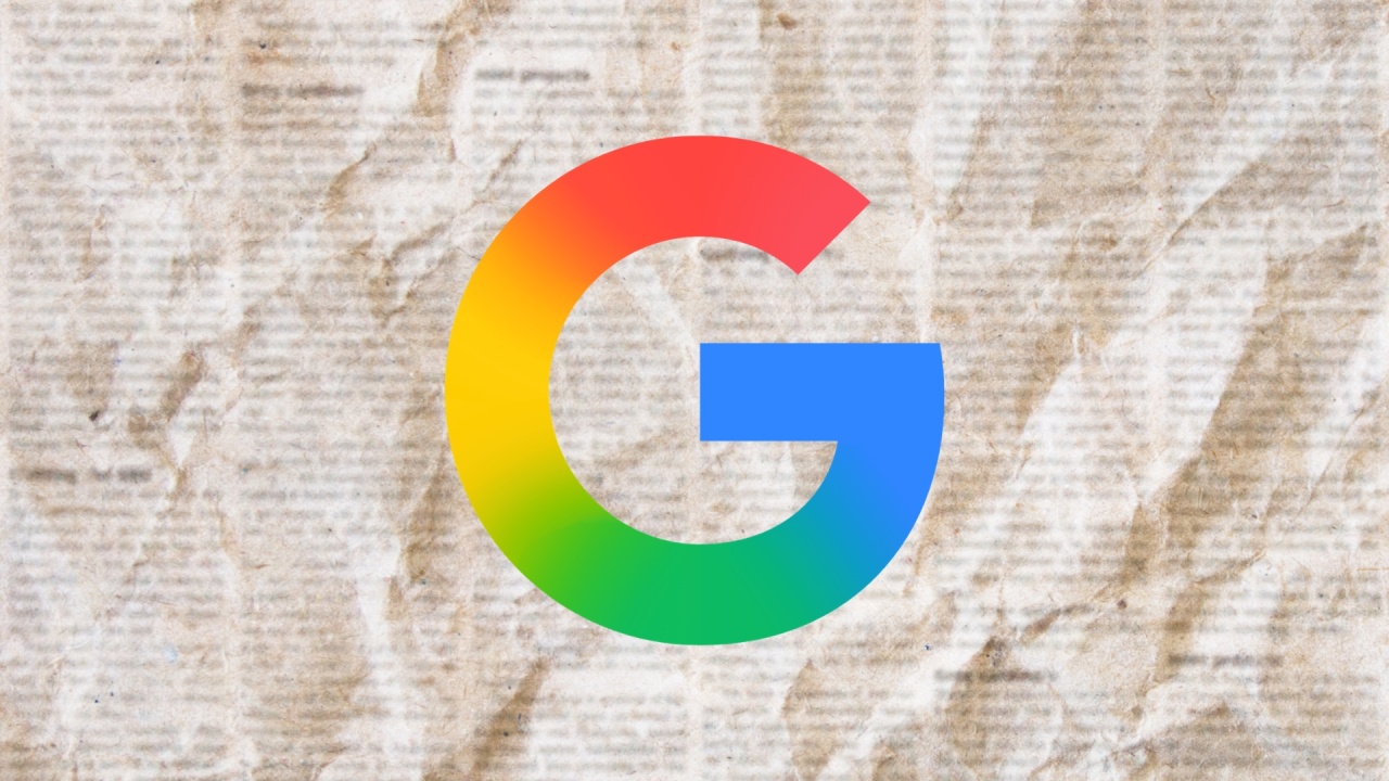 Google logo em cima de jornais