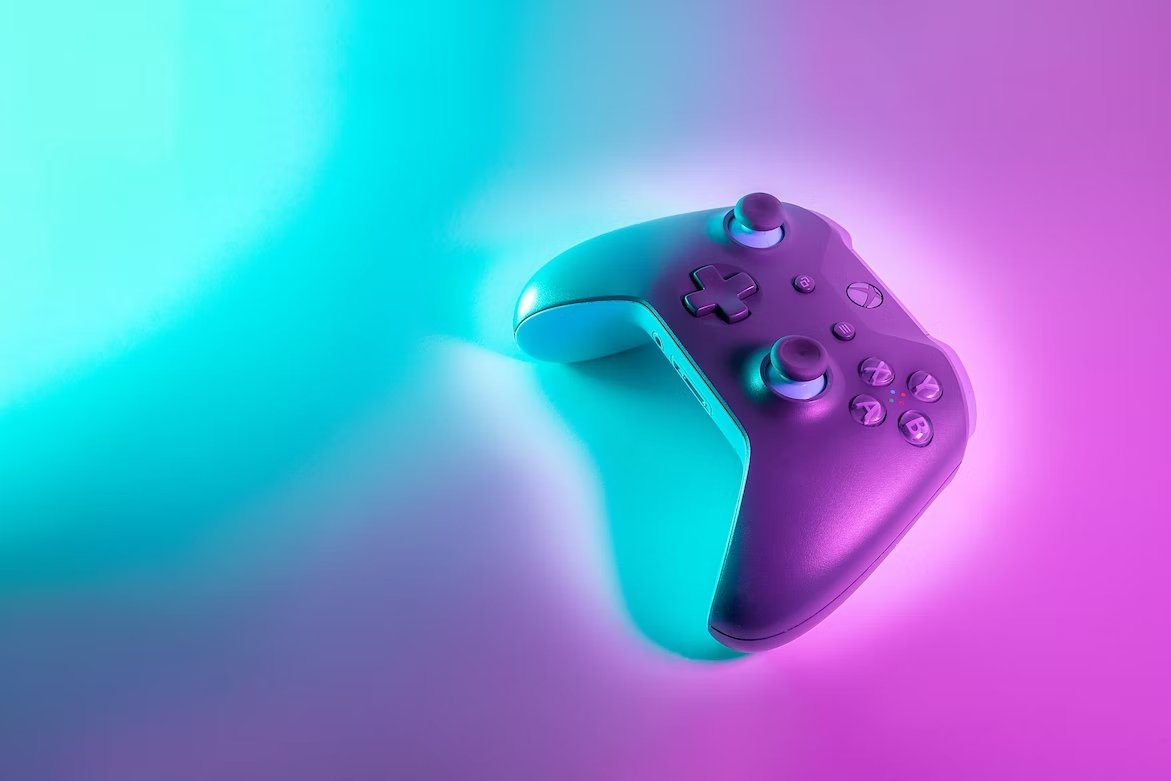 Comando da Xbox sobre luz rosa e azul