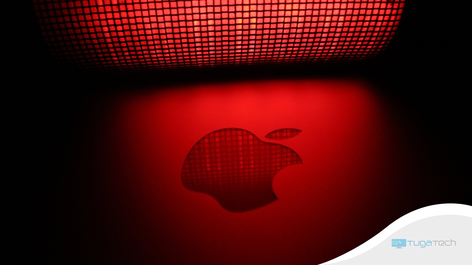 Apple logo sobre fundo vermelho