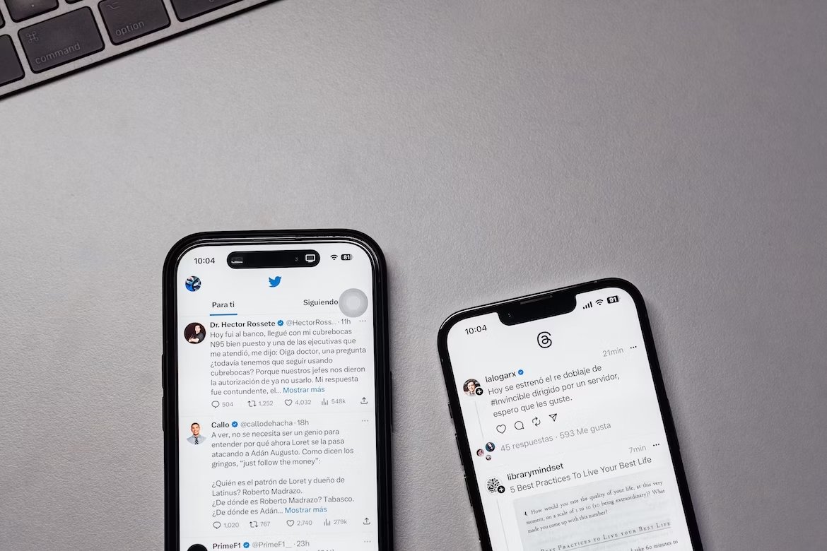 App do Threads e do Twitter em smartphones diferentes