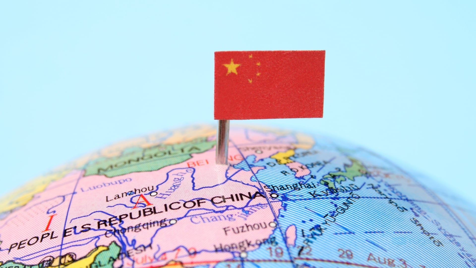 Bandeira da China sobre globo