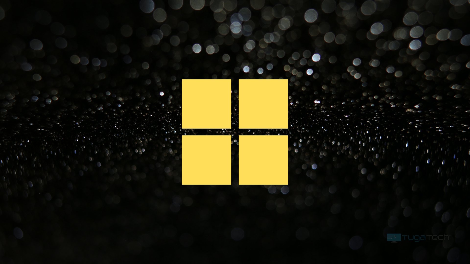 Logo do Windows 11 em tom amarelo com fundo preto