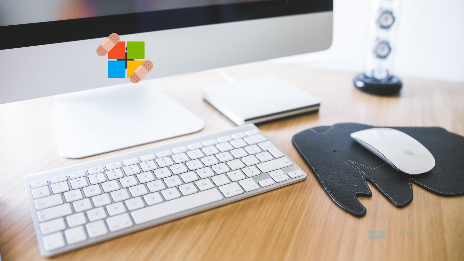 Apple iMac com ícone da Microsoft colado